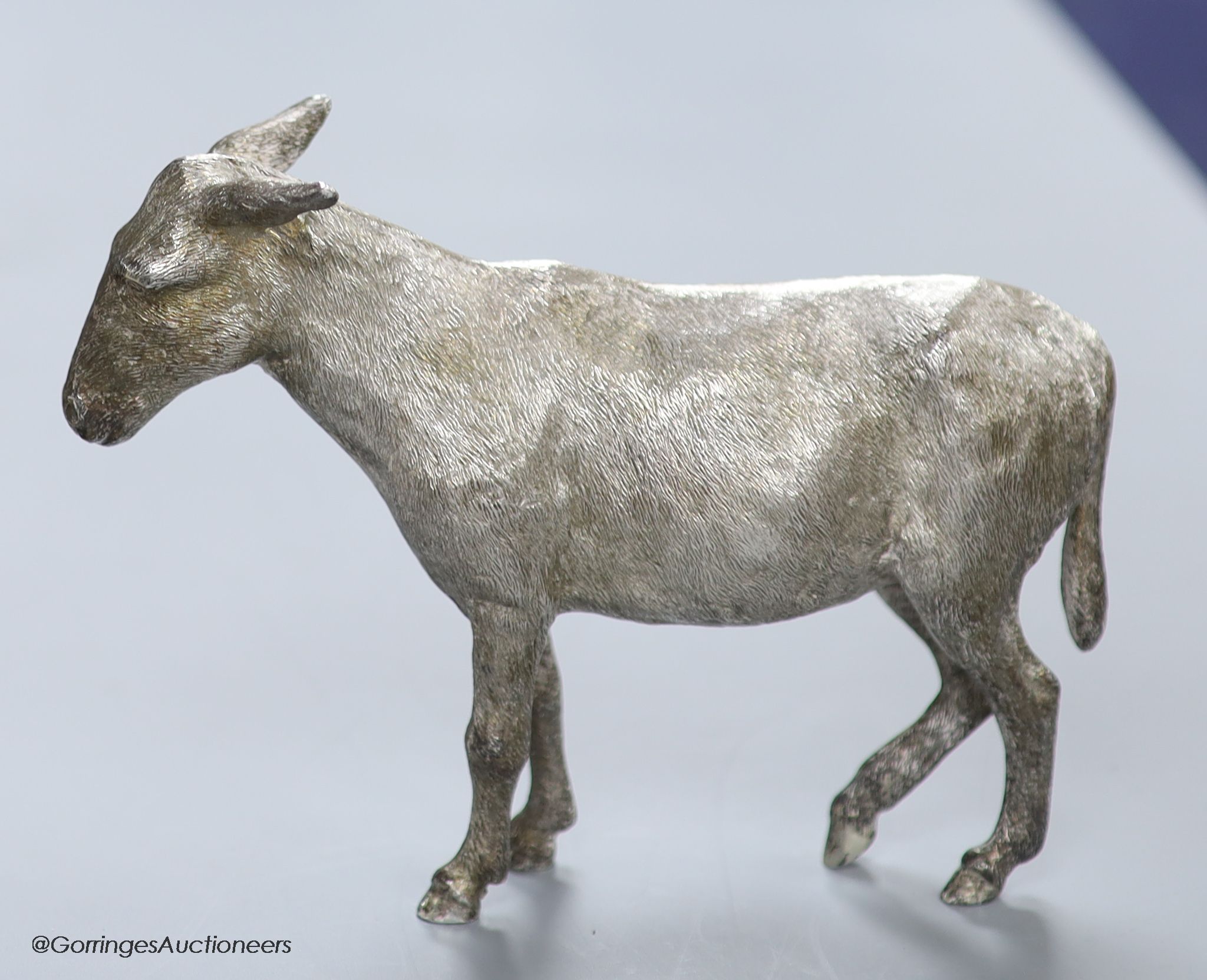 A 1960s' free standing silver miniature model of a donkey, Edward Barnard & Sons, London, 1964, height 12.5cm, 20.5oz.